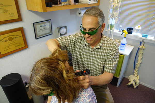 Cold laser therapy in a treatment room