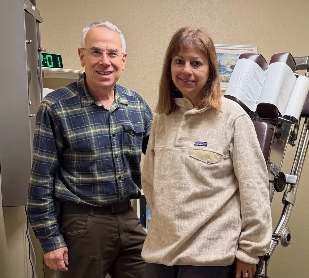 Dr. Siegel with his wife Genie in a treatment room at CK Chiropractic Office